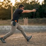 Shooter performing dynamic movement training indoors