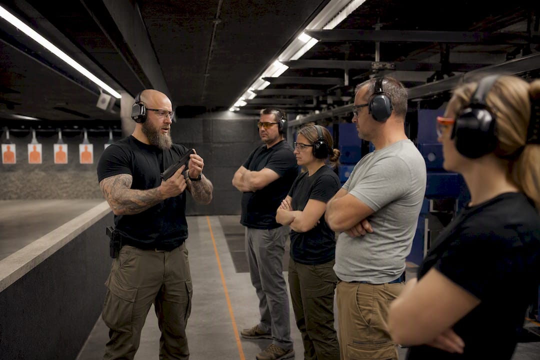 Instructor giving firearms safety briefing