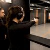 Left-handed shooter under instructor supervision