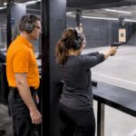 Company team competes at an indoor shooting range